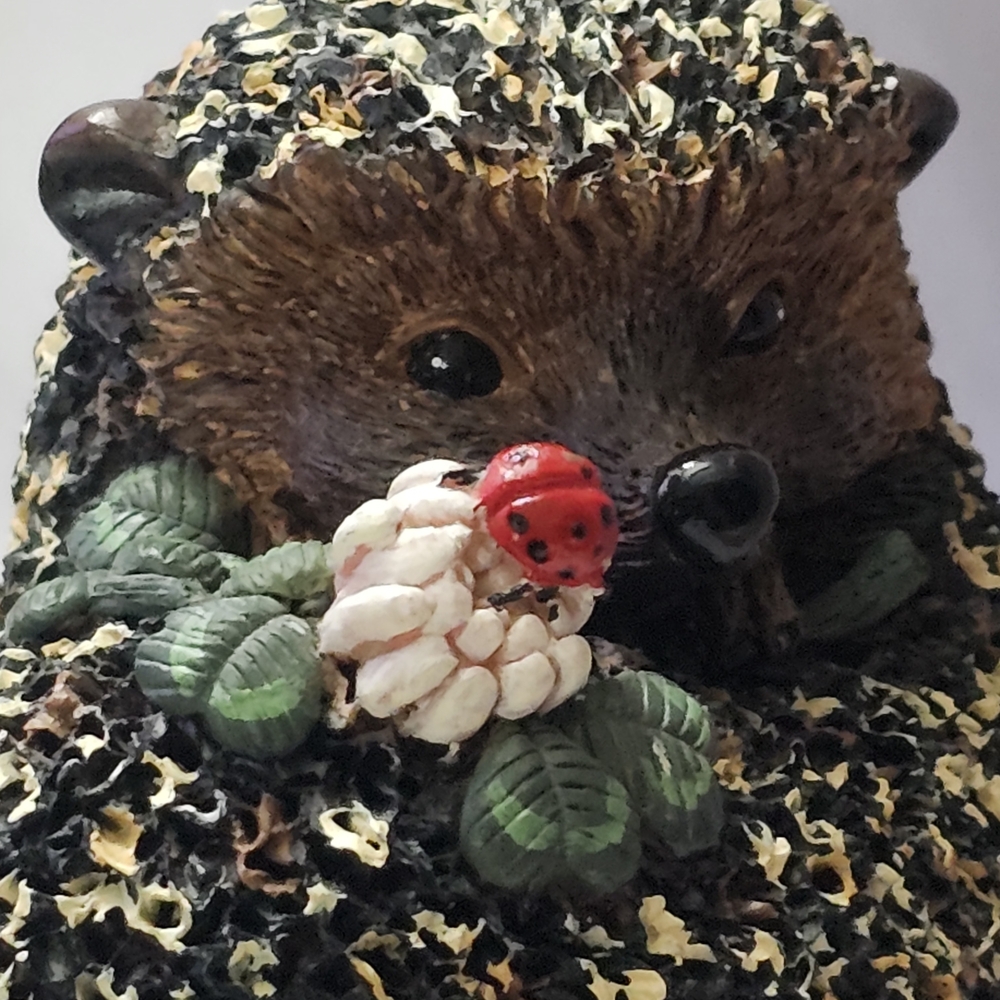 Charming Life-like Hedgehog Holiday Decor with Ladybug Accent